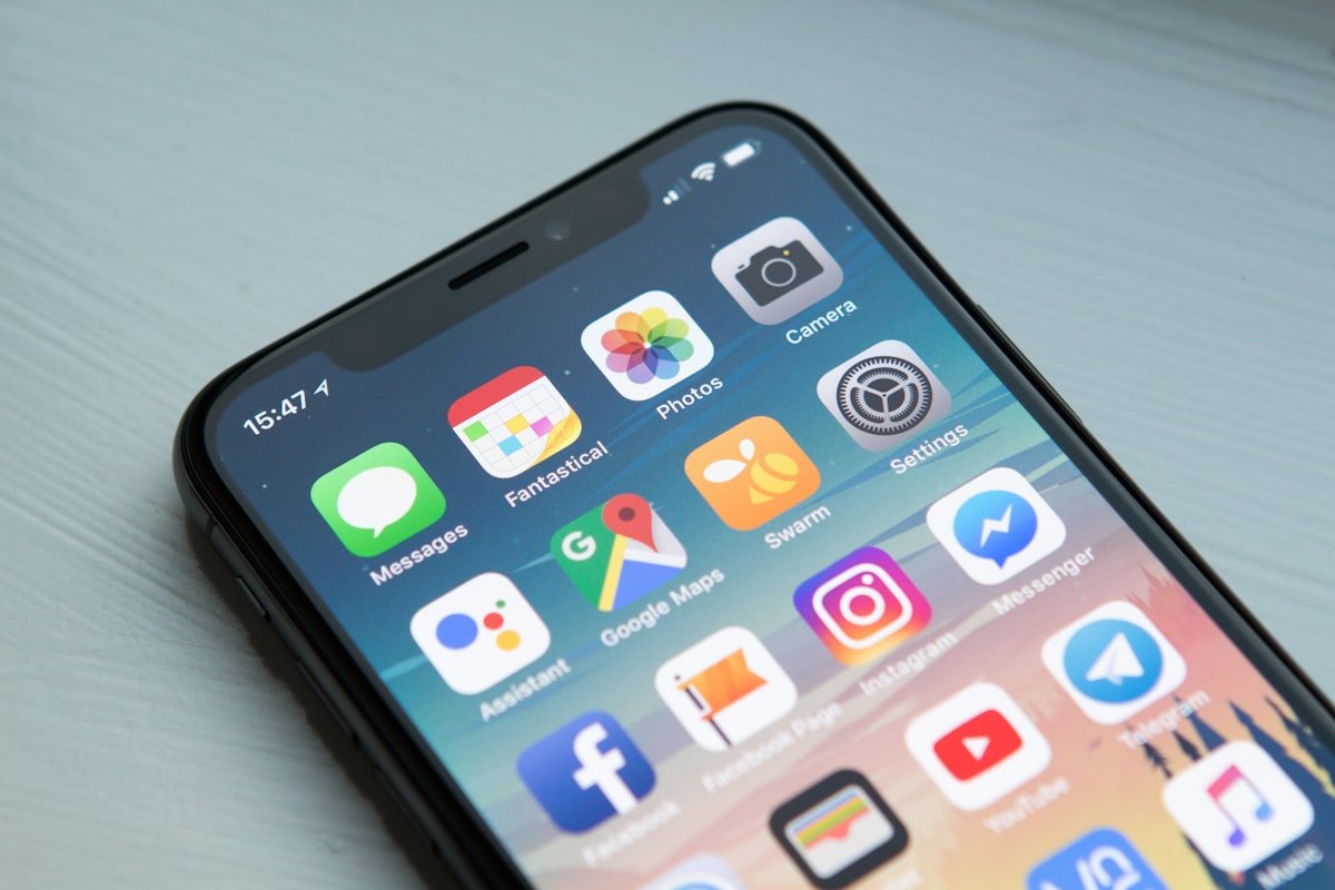 Mobile app development in Pune — floating iOS and Android app screens